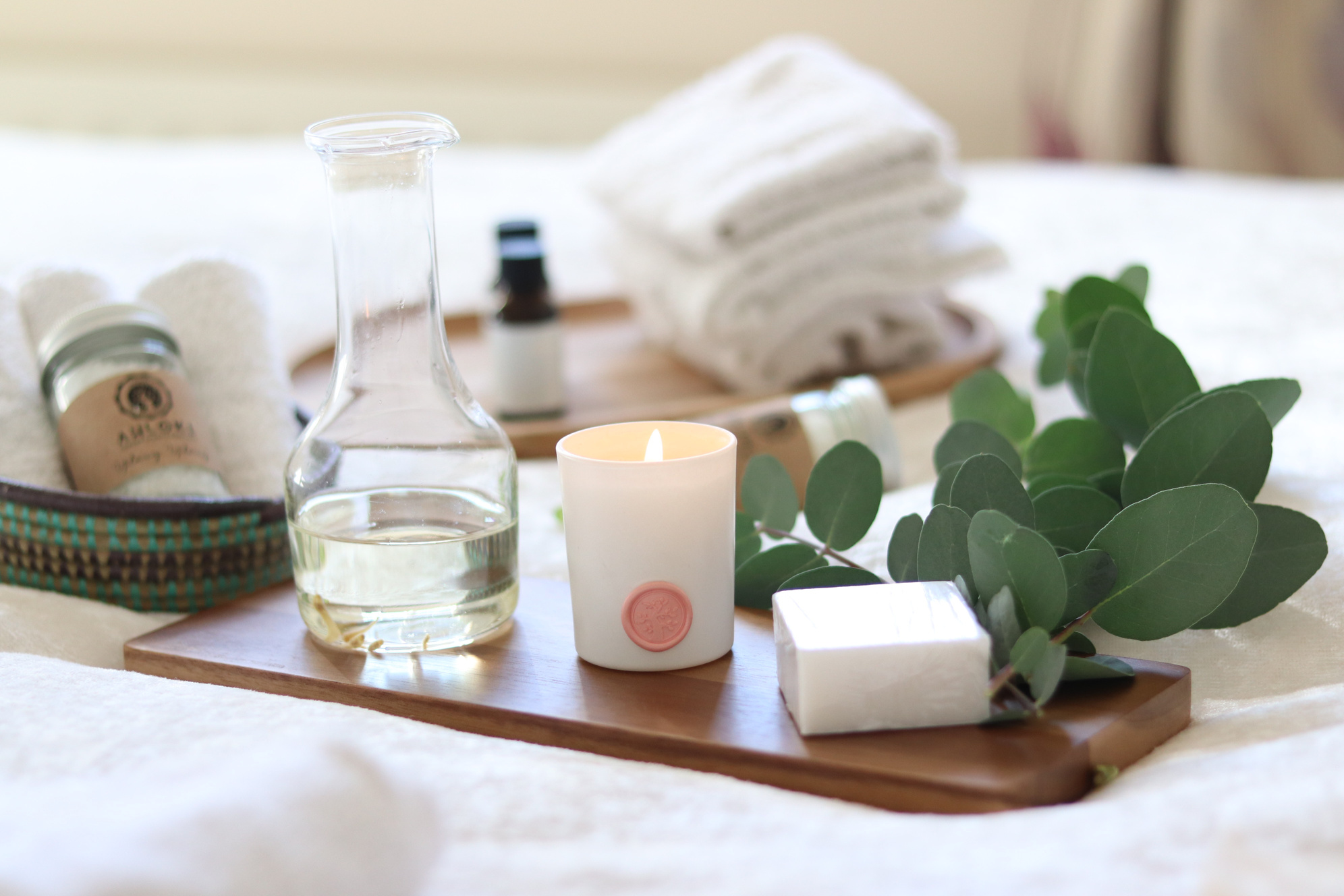 Clear Glass Bottle With White Pillar Candle